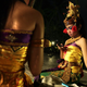 Indonesian traditional dancers using mobile phones